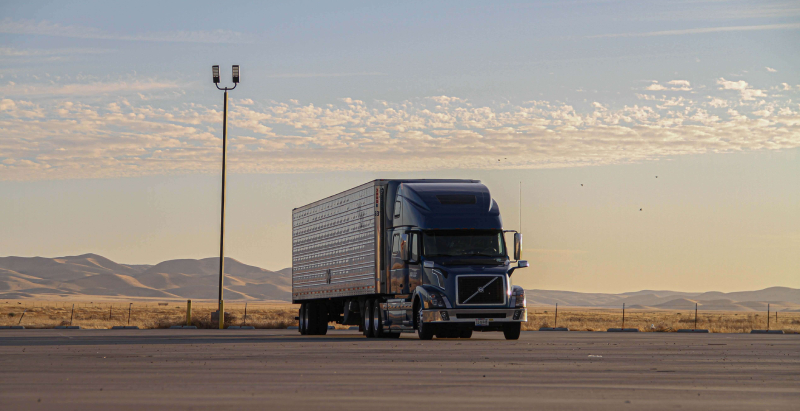 A large truck is parked on the side of the road.